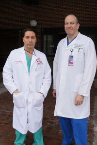 Westchester Medical Center's Dr. Joseph Turkowski (left) and Dr. Ivan Miller outside the Taylor Pavilion following a briefing with press on the status of the Metro North crash victims.