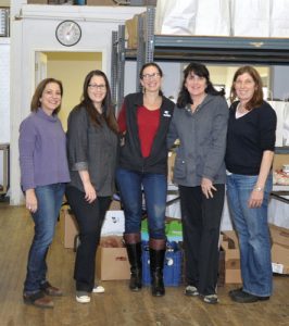 At the Wholeshare distribution site, from left to right: Ilene Popkin, Debbie Rogers, Robin Murphy, Linda McGetrick and Nancy Silver. Photos by Carolyn Simpson