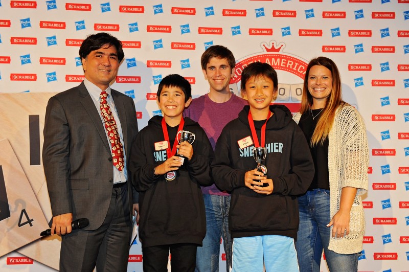 L-R: John Chew, Co-president of the North American SCRABBLE Players  Association; Cooper Komatsu, 7th grader from Los Angeles; Conrad Bassett-Bouchard, 2014 National SCRABBLE Champion; Sheng Guo; and Danielle Armbrust, Senior Director Global Brand Marketing and Strategy at Hasbro / Photo credit: Patricia A Hocker, NASPA