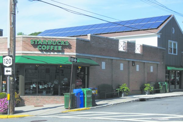 A first commercial solar installation on Greeley Avenue in Chap- paqua, which won Sunrise Solar an award from the Town of New Castle’s Sustainability Committee.