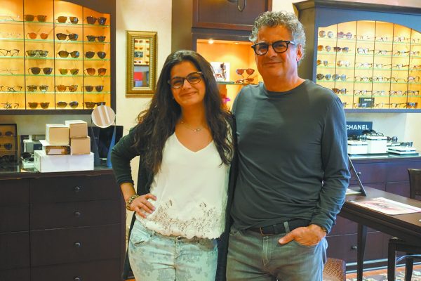 Jaime and his daughter Alex inside Eye Designs of Armonk